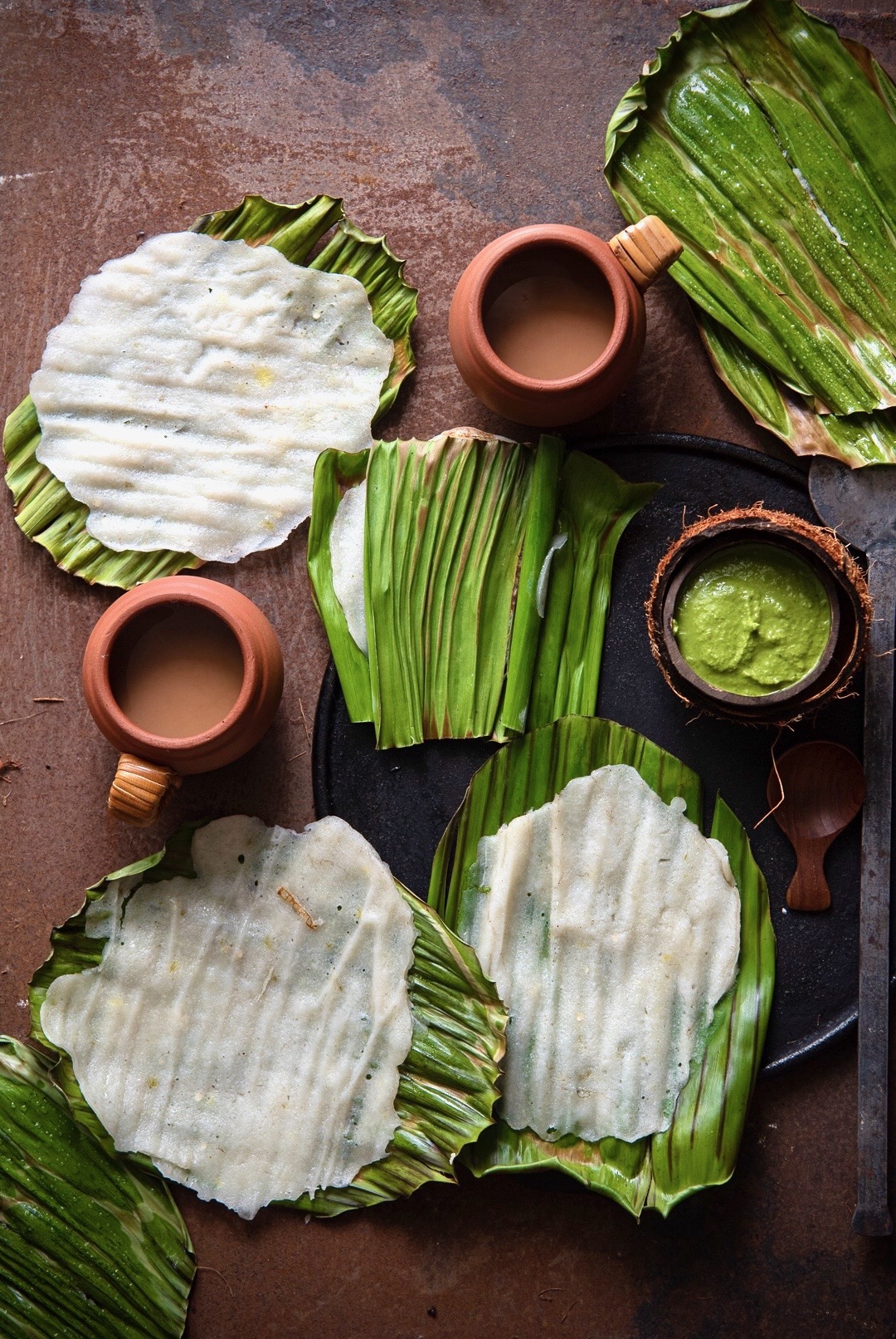 Panki -delicate rice flour crepes steamed in banana leaf - theroute2roots